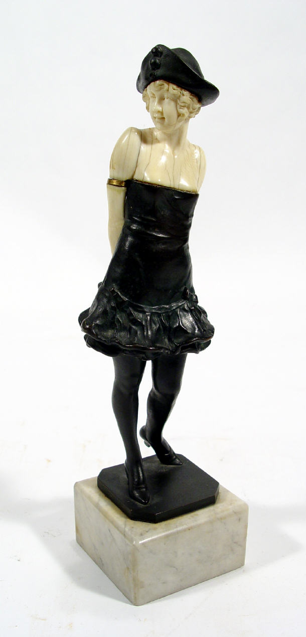 Appraisal: Lorenzl Art Nouveau bronze and ivory figurine on a grey