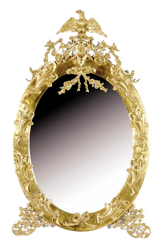 Appraisal: Victorian style brass mirror th century oval brass frame with