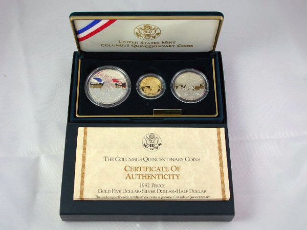 Appraisal: Columbus three coin proof set with gold silver dollar and