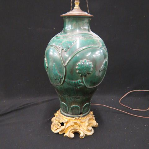 Appraisal: Early Chinese Pottery Lamp French Bronzebase deep green with raised