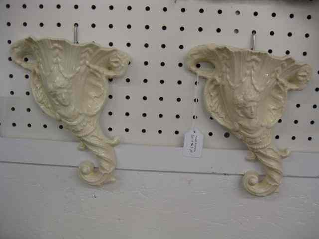 Appraisal: Pottery Wall Pockets cornucopia style with bust of a maiden