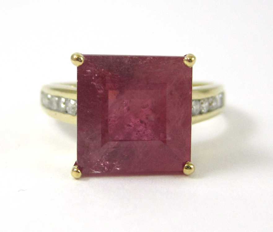 Appraisal: RUBY DIAMOND AND FOURTEEN KARAT GOLD RING with a row