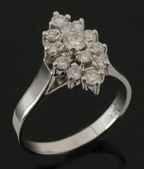 Appraisal: A diamond cluster ring The marquise shaped cluster set with