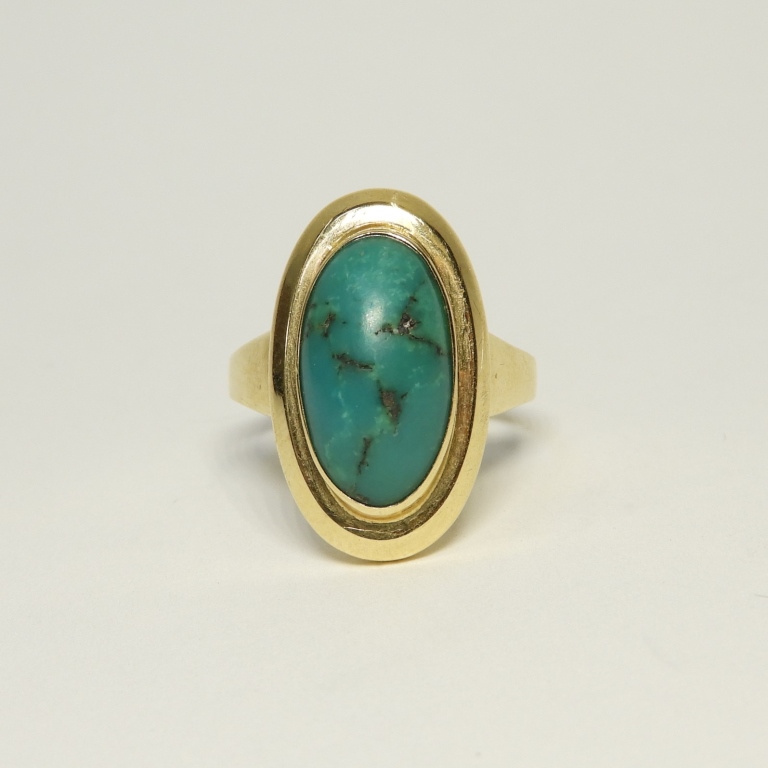 Appraisal: K YELLOW GOLD TURQUOISE CABOCHON STONE RING Unknown th CenturyOval