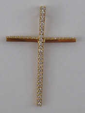 Appraisal: A carat gold cross pendant set with clear stones approx