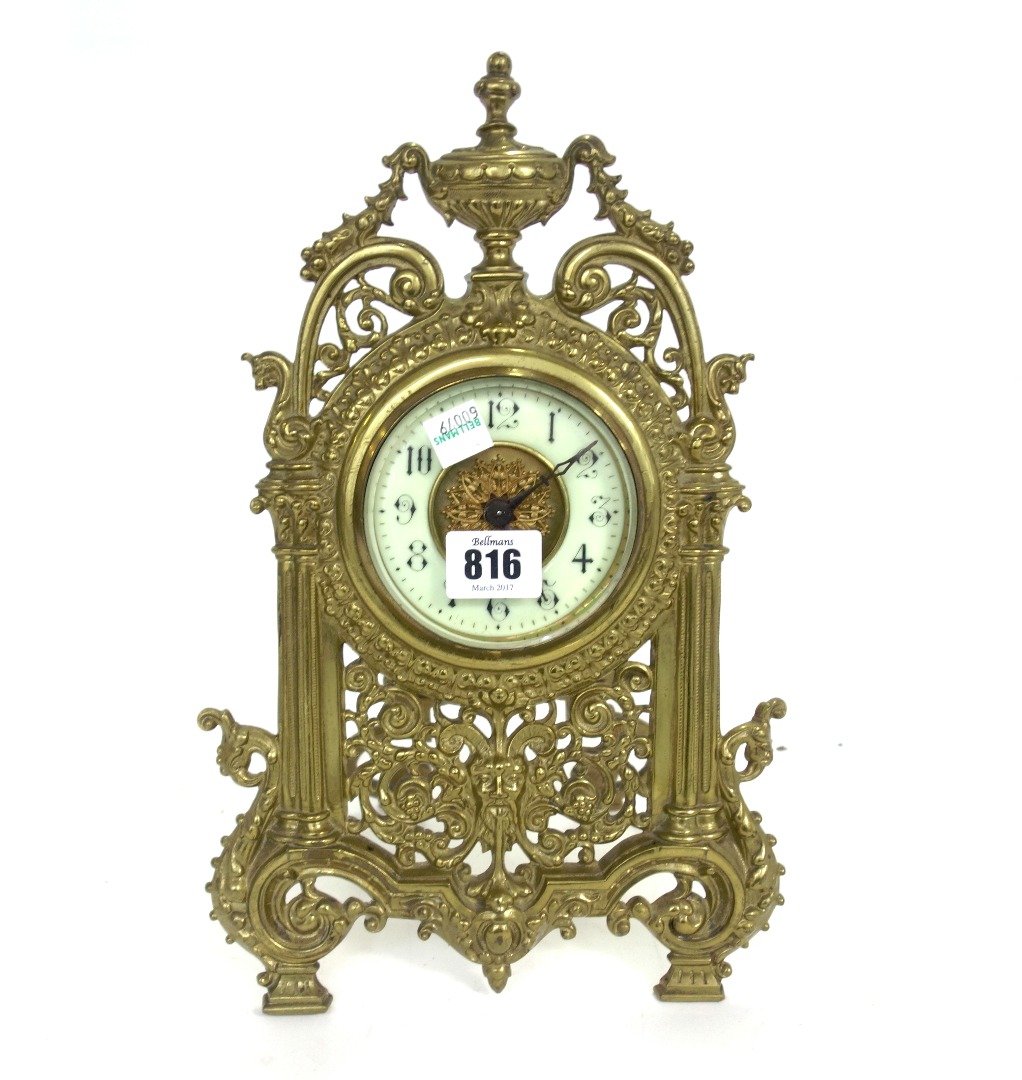 Appraisal: A brass strut back mantel clock early th century with