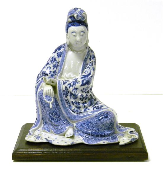 Appraisal: Japanese porcelain blue and white seated figure of Kannon modeled