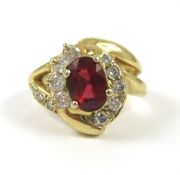 Appraisal: SYNTHETIC RUBY DIAMOND AND FOURTEEN KARAT GOLD RING with twelve