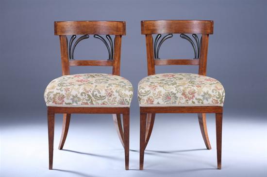 Appraisal: PAIR BIEDERMEIER SIDE CHAIRS th century Curving crest rails over