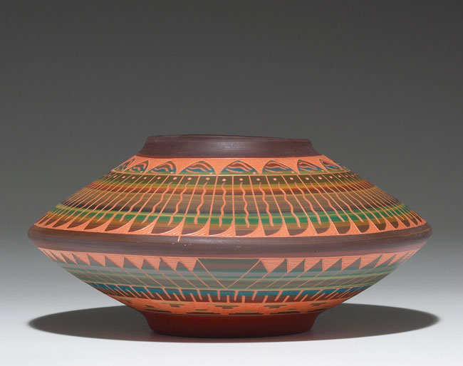 Appraisal: Navajo vase flaring factory produced shape with incised geometric designs