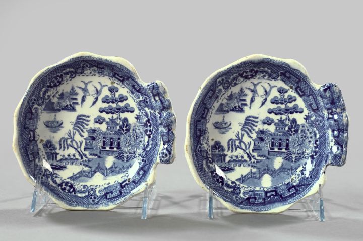 Appraisal: Pair of Staffordshire Blue and White Pottery Blue Willow Condiment