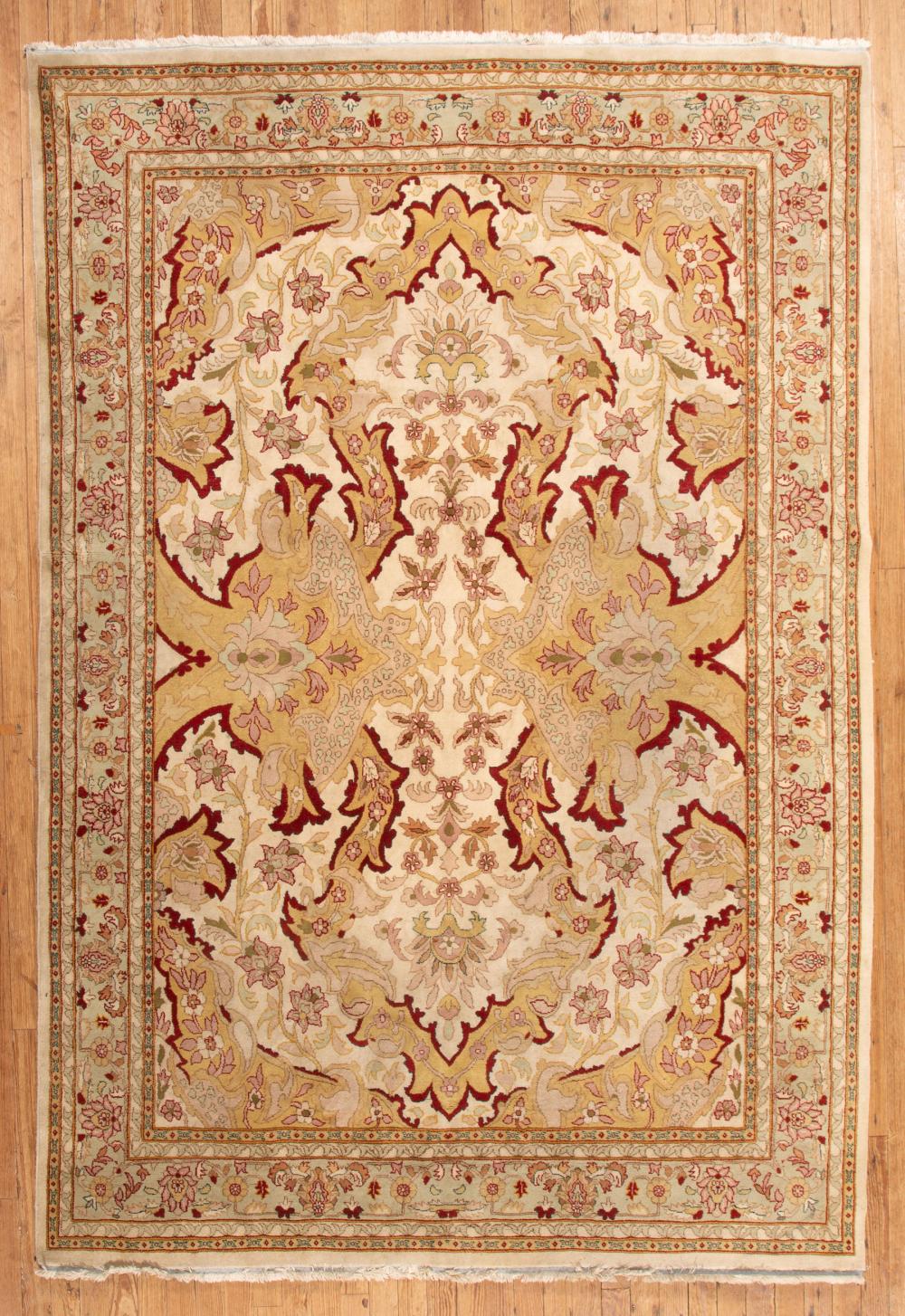 Appraisal: Agra Carpet cream and pale yellow ground foliate design in