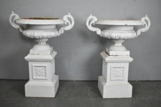 Appraisal: Pair of Cast Iron Urns on Stands Urns and stands