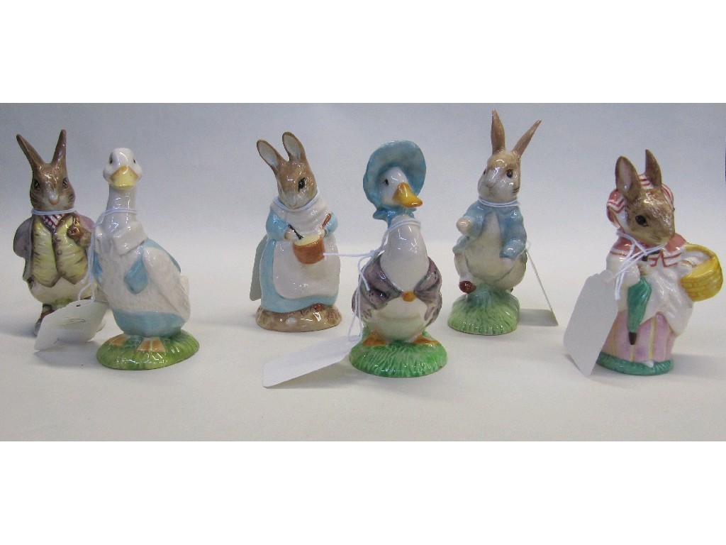 Appraisal: Five Beswick Beatrix Potter figures to include Mrs Rabbit Peter