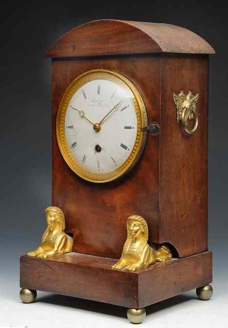 Appraisal: AN EARLY TH CENTURY FRENCH MAHOGANY MANTEL TIMEPIECE the convex