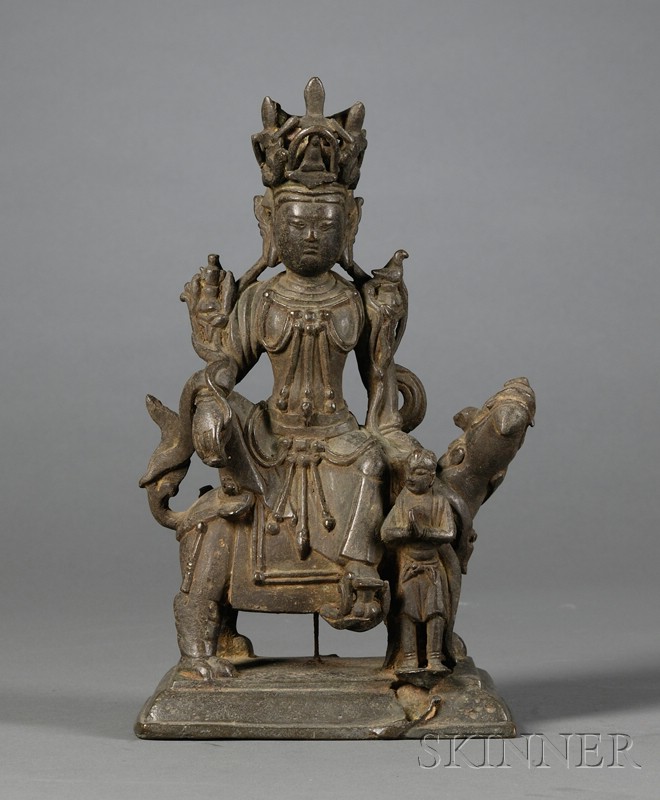 Appraisal: Bronze Manjushri China Ming dynasty depicted seated on a lion