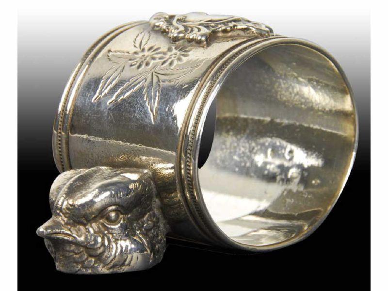 Appraisal: Bird Cat Heads Figural Napkin Ring Description Illegible manufacturer's name