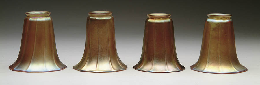 Appraisal: FOUR STEUBEN ART GLASS SHADES Four Steuben shades are gold