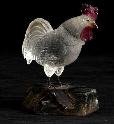 Appraisal: CARVED ROCK-CRYSTAL FIGURE OF A COCKEREL With rose crest standing