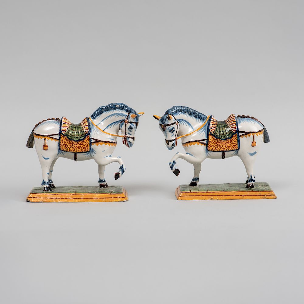 Appraisal: Pair of Small Dutch Delft Models of Prancing Horses Each