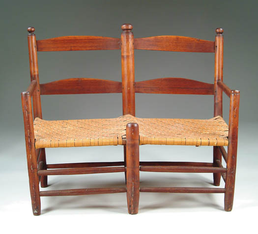 Appraisal: GOOD LADDERBACK WAGON BENCH The two seat bench has two