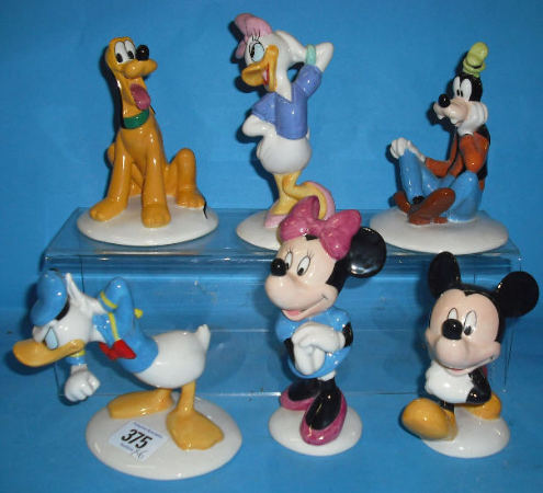 Appraisal: A Collection of Royal Doulton Disney Figures Mickey Mouse MM