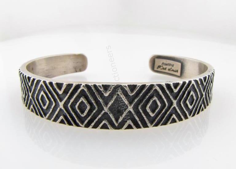 Appraisal: A sterling silver Navajo cuff bracelet by Kirk Smith dwt