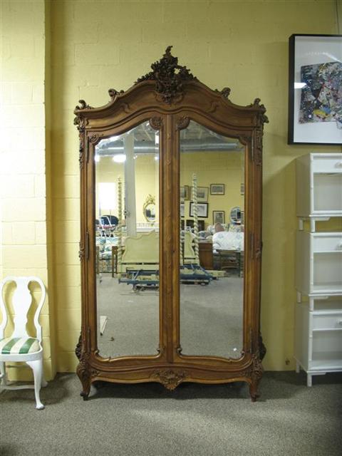 Appraisal: LOUIS XV XVI STYLE M CRUYEN WALNUT ARMOIRE Late th