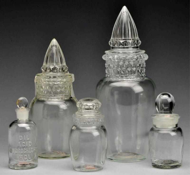 Appraisal: Lot of Assorted Glass Apothecary Jars with Lids Description Five