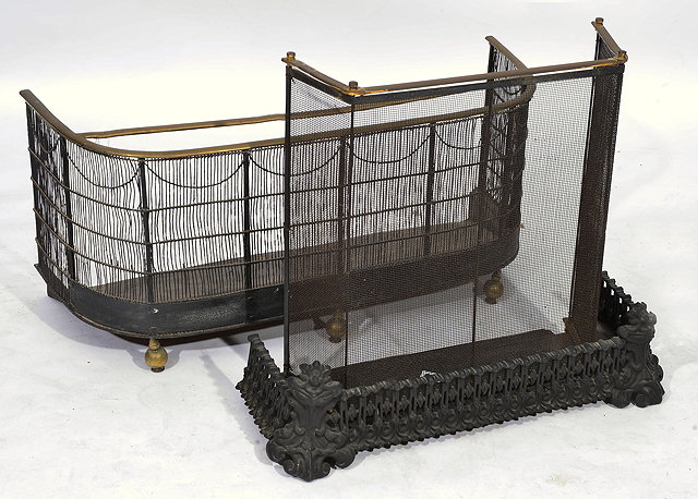 Appraisal: A VICTORIAN WIREWORK AND BRASS FIRE GUARD cm wide another