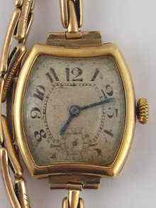 Appraisal: An carat gold wrist watch by Movado on a carat