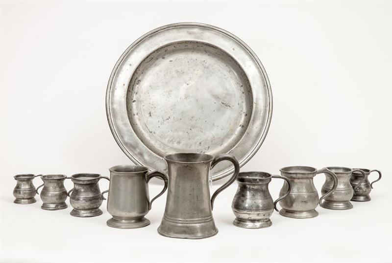 Appraisal: English Pewter Circular Platter and Nine Pewter Mugs The platter