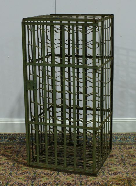 Appraisal: A painted iron wine cage with hinged door cm wide