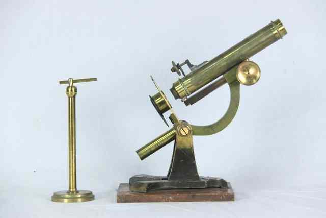 Appraisal: A brass microscope by J and C Robbins London in