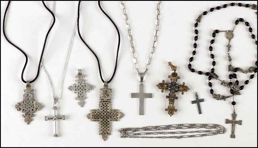 Appraisal: THREE STERLING SILVER CROSSES Together with a marcasite and coral