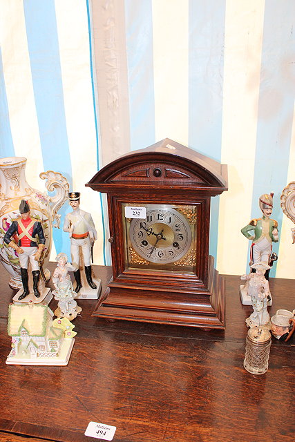 Appraisal: AN OAK CASED MANTEL CLOCK with silvered brass dial Arabic