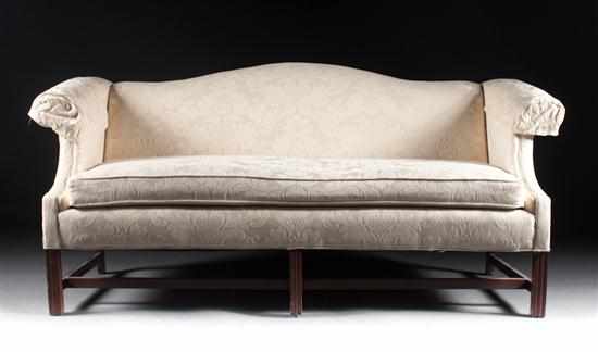 Appraisal: Chippendale style mahogany upholstered camelback sofa th century Clayton Marcus