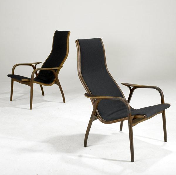 Appraisal: YNOVE EKSTROM Pair of lounge chairs with stretch upholstery in