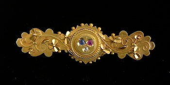 Appraisal: A Victorian Bar Pin with Gemstones k yellow gold bar