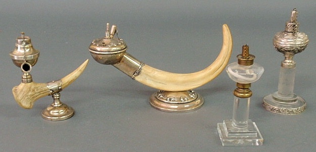 Appraisal: Two sterling silver and horn lighting devices and two glass