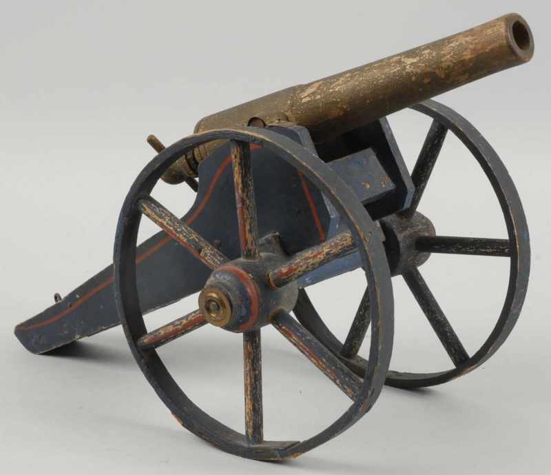 Appraisal: Early Wooden WWI-Type Cannon Toy Description Appears to shoot wooden