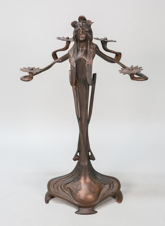 Appraisal: ART NOUVEAU FIGURAL PATENTED METAL CANDLESTICKArt Nouveau figural patented metal