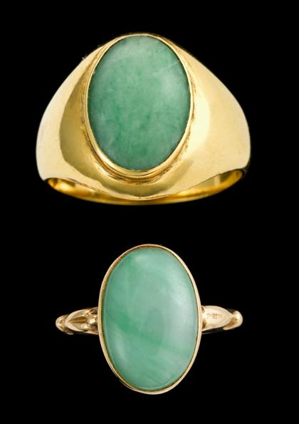 Appraisal: Two Chinese k yellow gold and green jade rings th