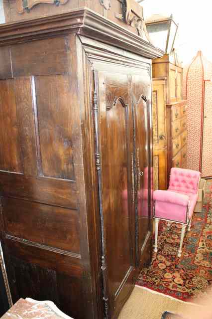 Appraisal: A LATE TH CENTURY CONTINENTAL ARMOIRE with two panelled doors