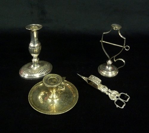 Appraisal: A Sheffield plated candlestick of oval baluster shape cm high