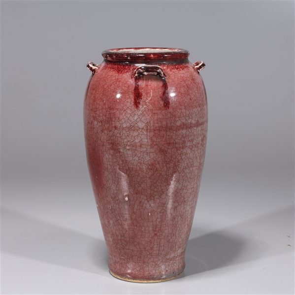 Appraisal: Chinese red crackle glazed porcelain vase with molded handles overall