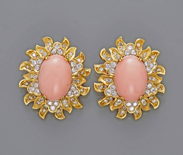 Appraisal: A pair of coral and diamond clip-earrings estimated total diamond