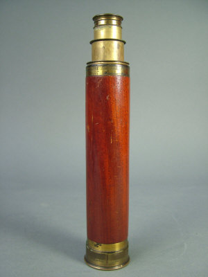 Appraisal: A th century gilt brass and wooden three draw telescope