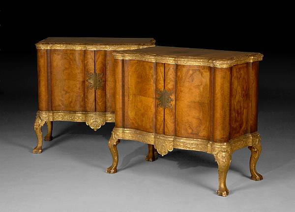 Appraisal: A pair of German Baroque style parcel gilt side cabinets