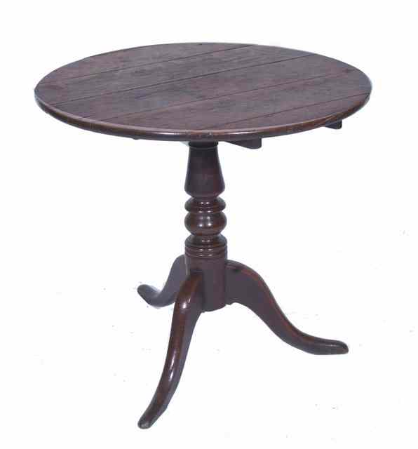 Appraisal: A TH CENTURY OAK TILT TOP TABLE the circular top